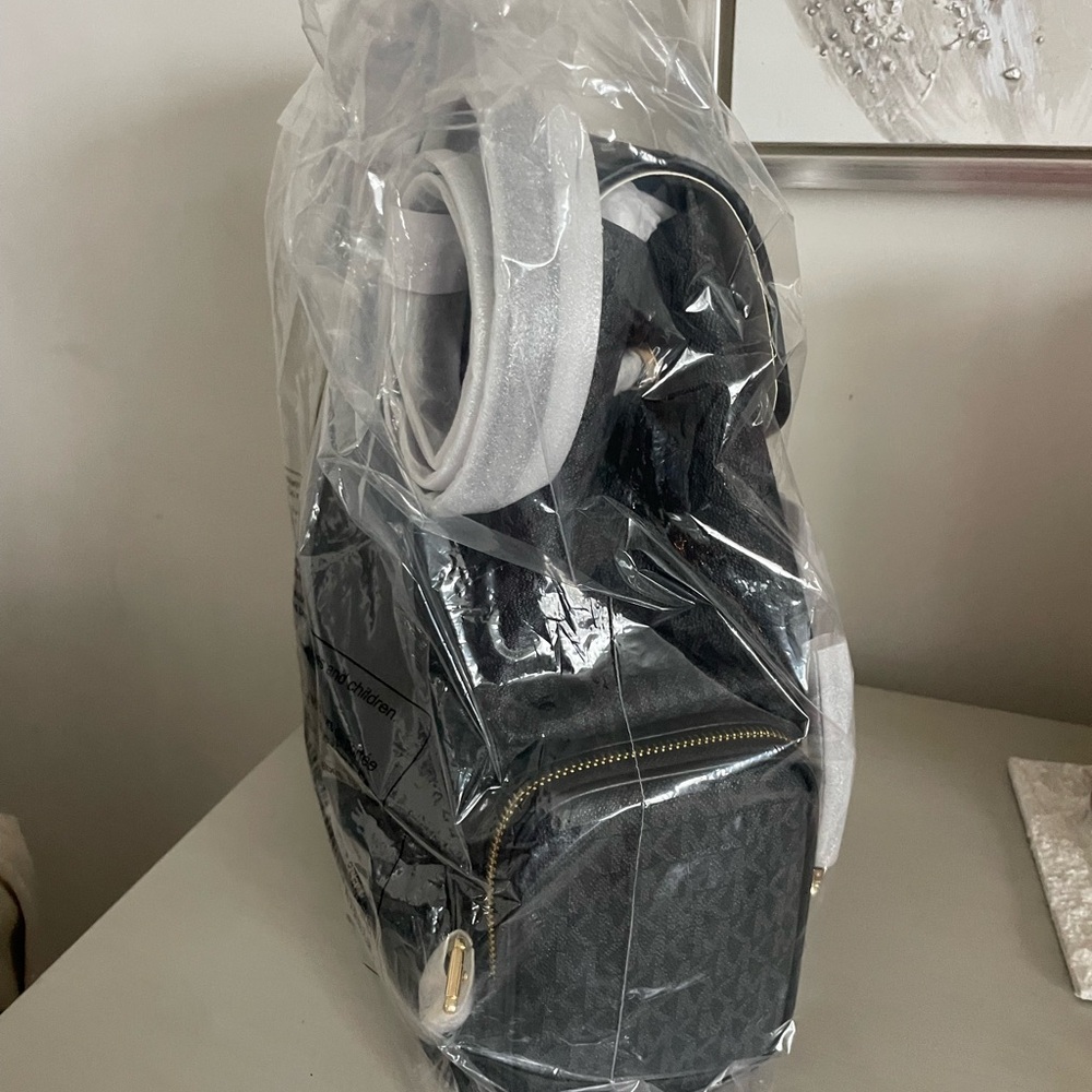 Michael Kors Black Backpack with Gold Accents - Picture 6 of 6